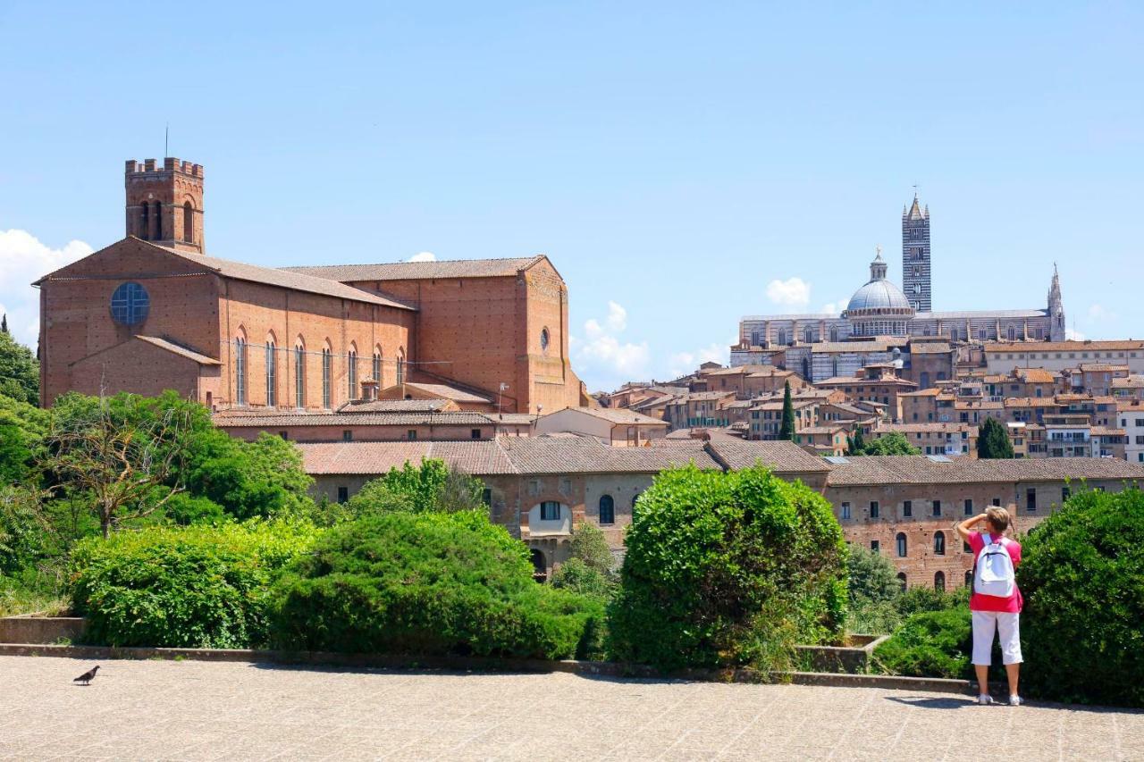 Siena Uptown - Sabrina'S Cozy Apartment Bagian luar foto