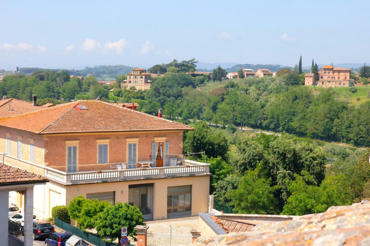 Siena Uptown - Sabrina'S Cozy Apartment Bagian luar foto
